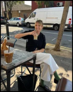 Drinking coffee Lizzy Hadfield